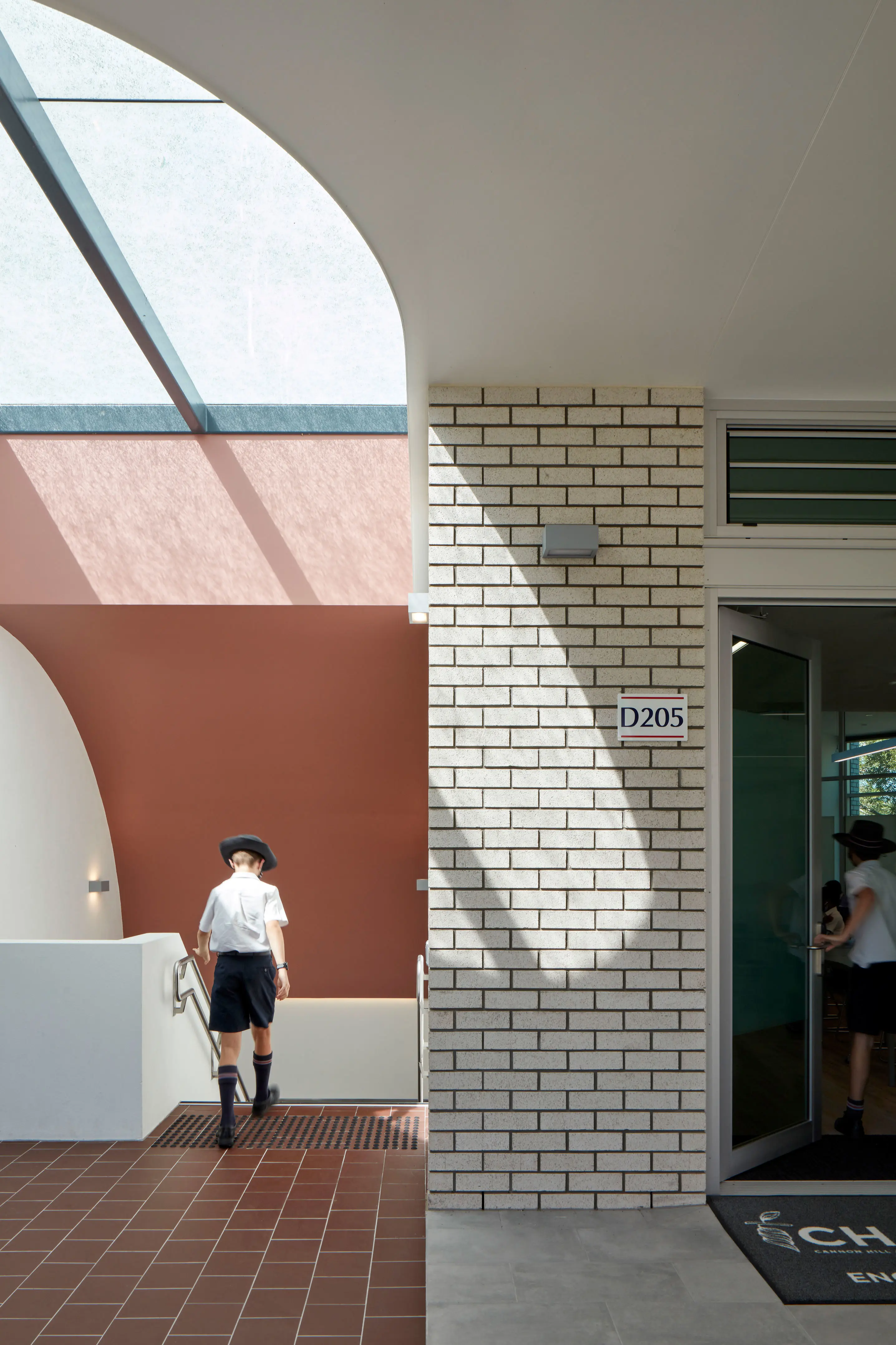 Boy descending school stairs