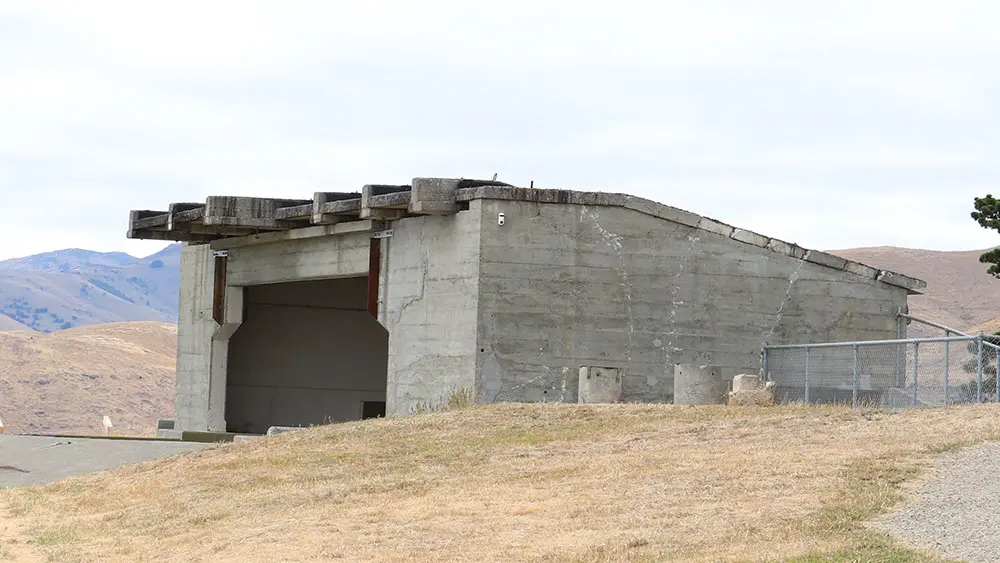 Awaroa/Godley head is a concrete bunker that looks out to sea