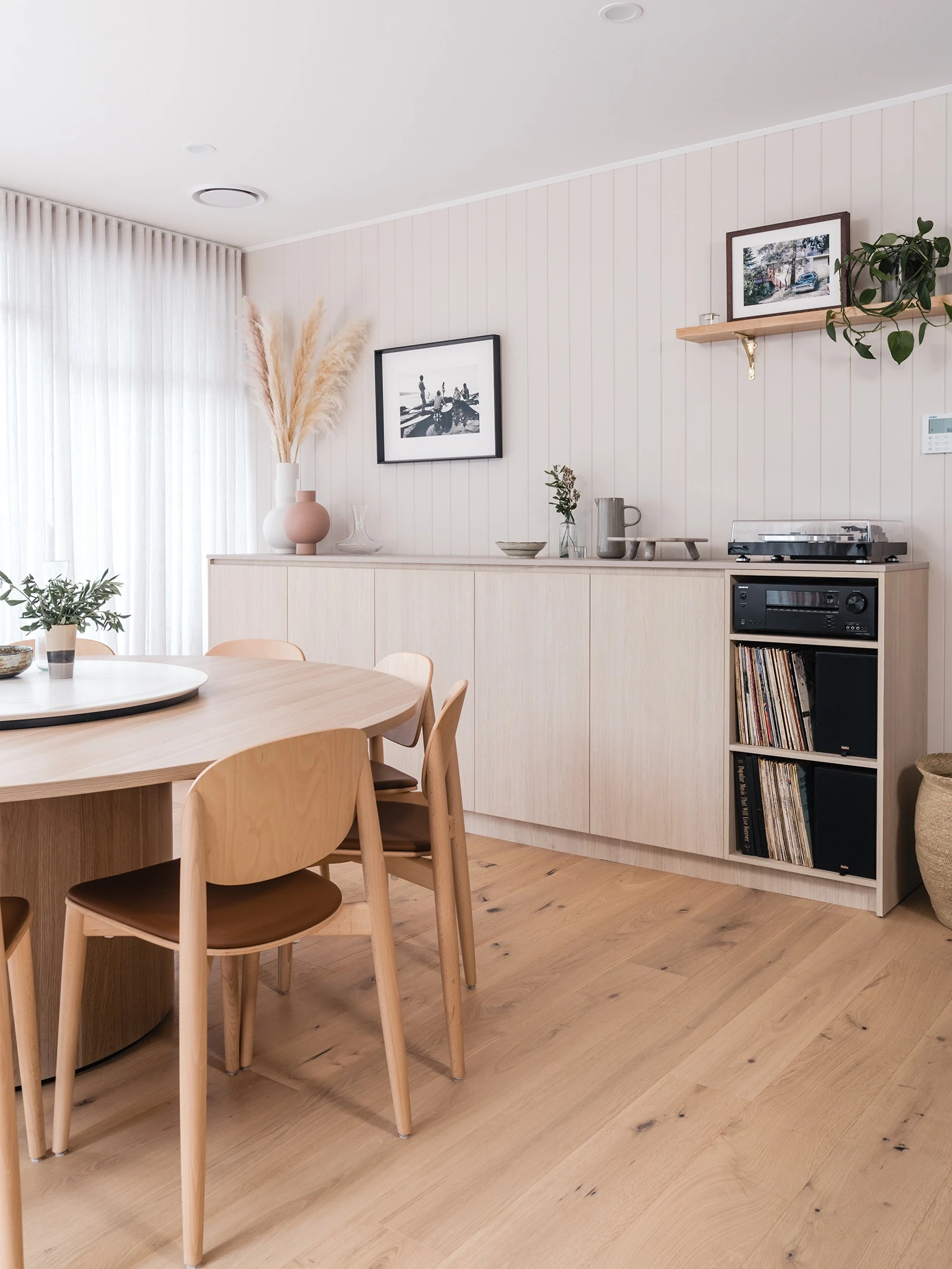 Interior dining room featuring neutral colour palette and timber dining table
