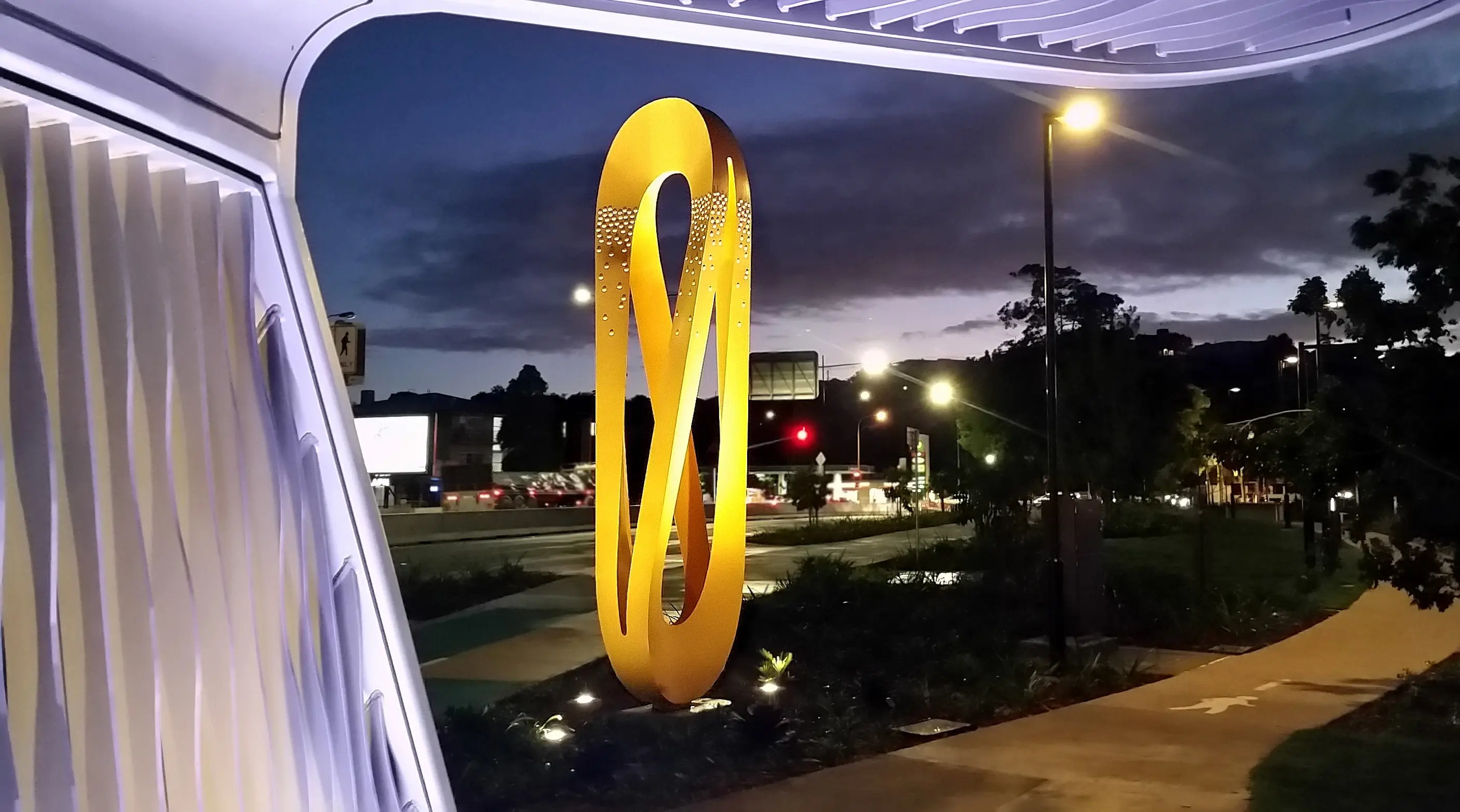 Yellow curved vertical public art