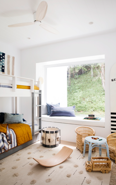 Children's bedroom in Dulux White on White with bunk and cane furniture.