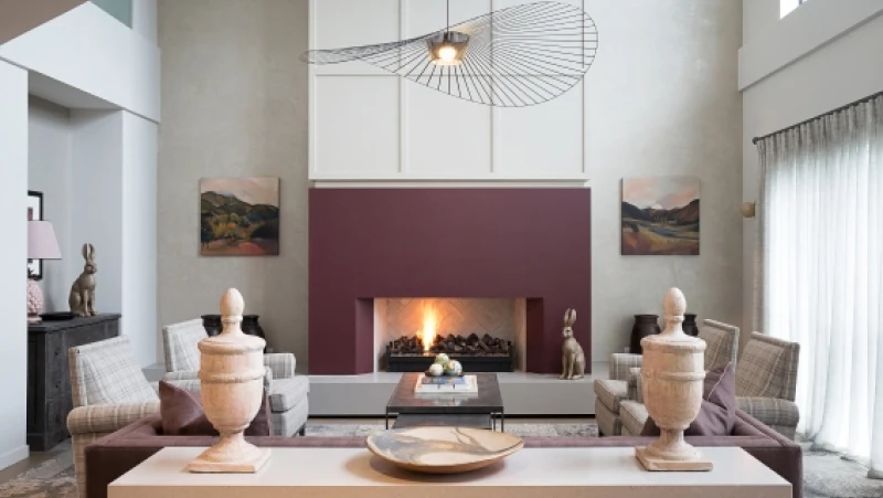 Cream and deep pink living room with fireplace