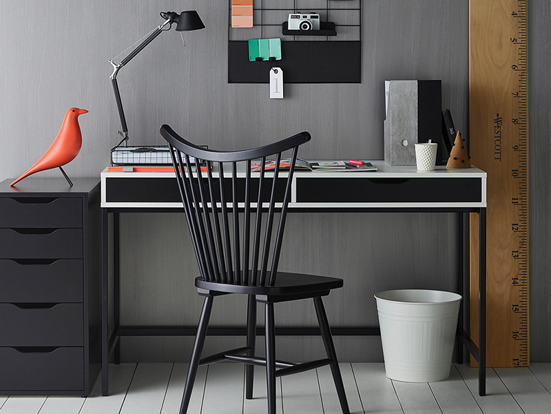 interior black study with chair and desk.