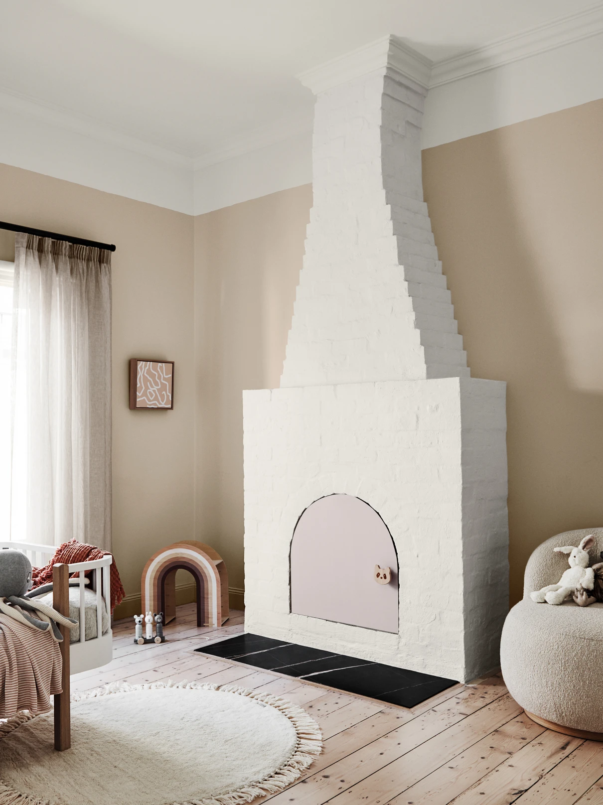 White textured fireplace in neutral bedroom. 