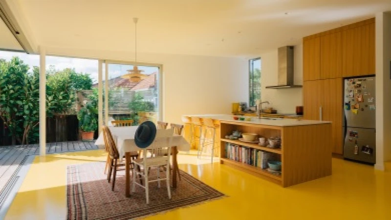 Open plan kitchen dining with yellow floor