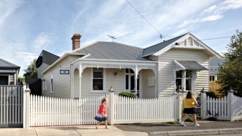 White double-fronted Victorian weatherboard house