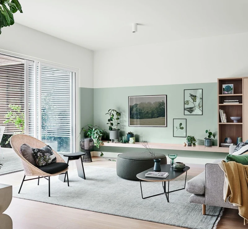 mint green living room.
Provide structure to your living area with two-tone pairing. Artwork: North Field by Adam Custins, Floating Leaves by Paper Collective and Yass Blue Grey Bush by Joanna Cole. 
Powdered Gum and Whisper White.