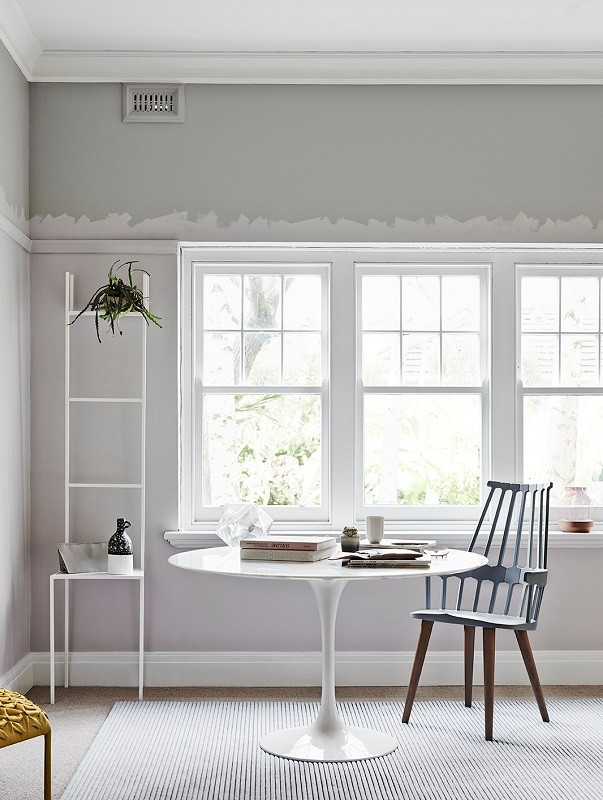 white table chair white window