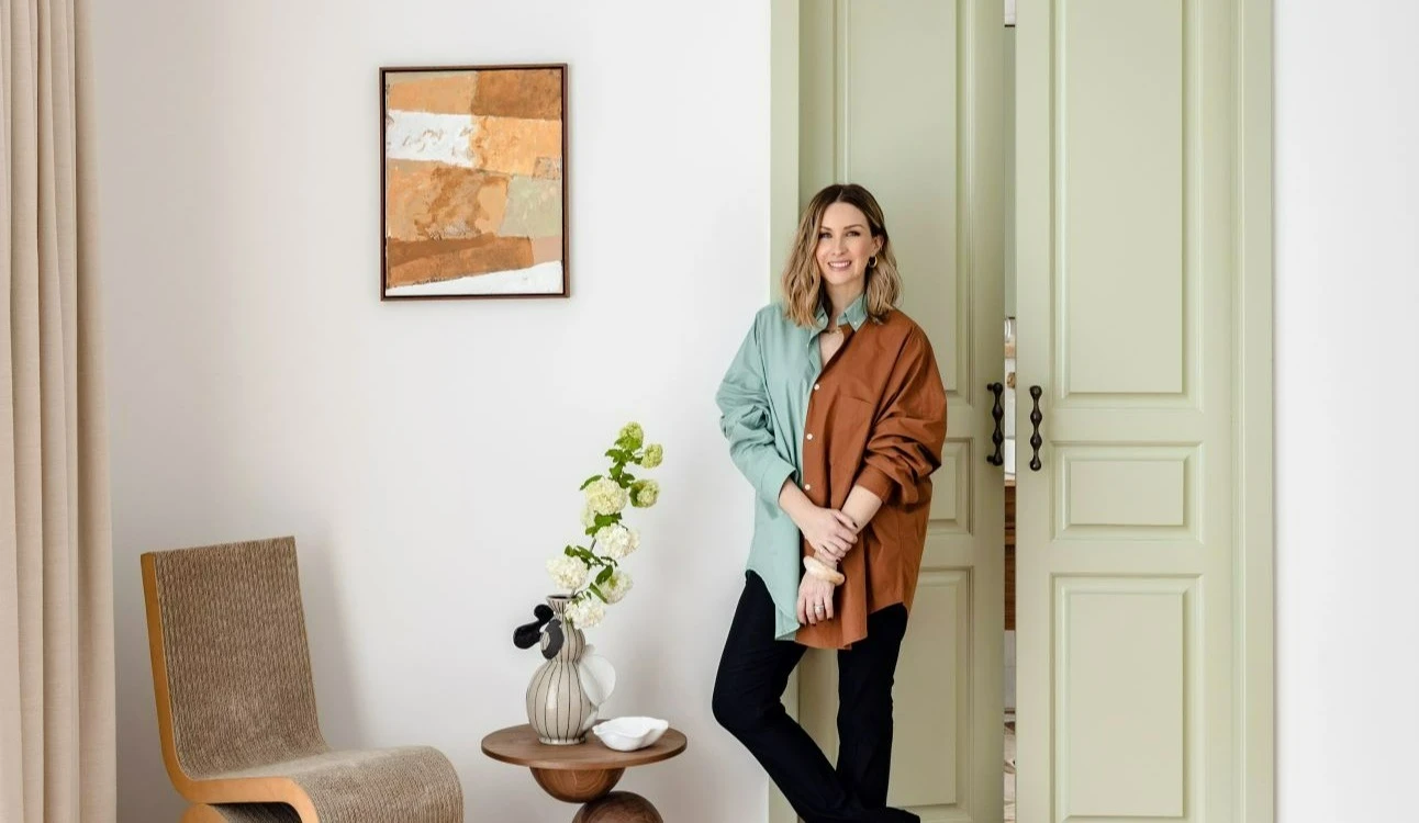 Interior stylist Kerrie-Ann Jones in master bedroom featuring Wasabi green French door