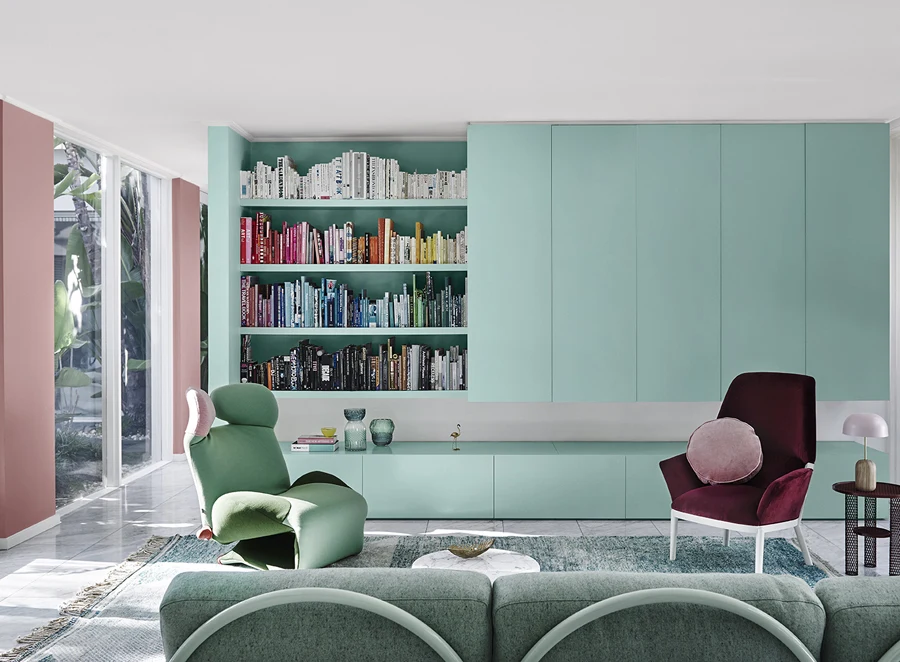 Living room with teal cabinetry