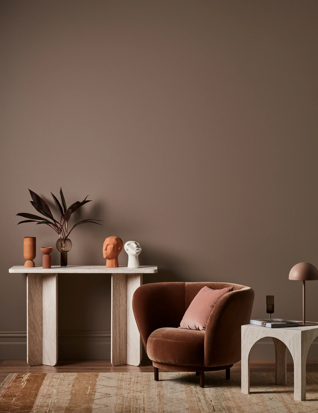 Living room with Toffee Fingers coloured wall, light timber furnishings and plush velvet seat