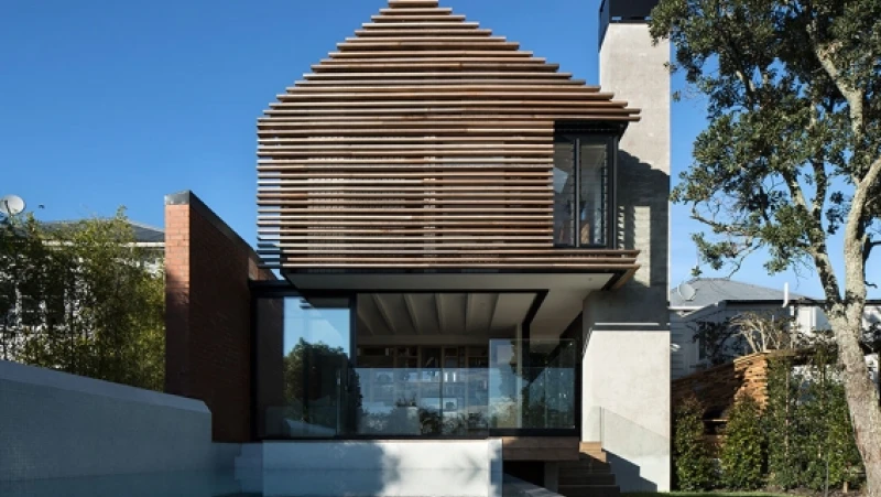 Double storey concrete and timber house