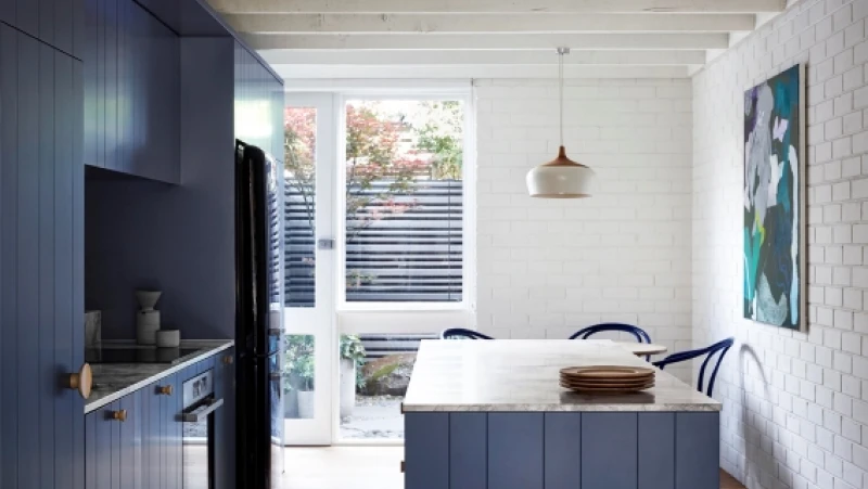 Blue and white kitchen with island bench