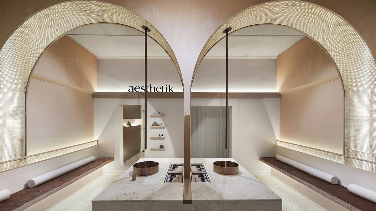 Inside of Aesthetick Skin and Lasic Clinc. Two large archways with minimalist design. 