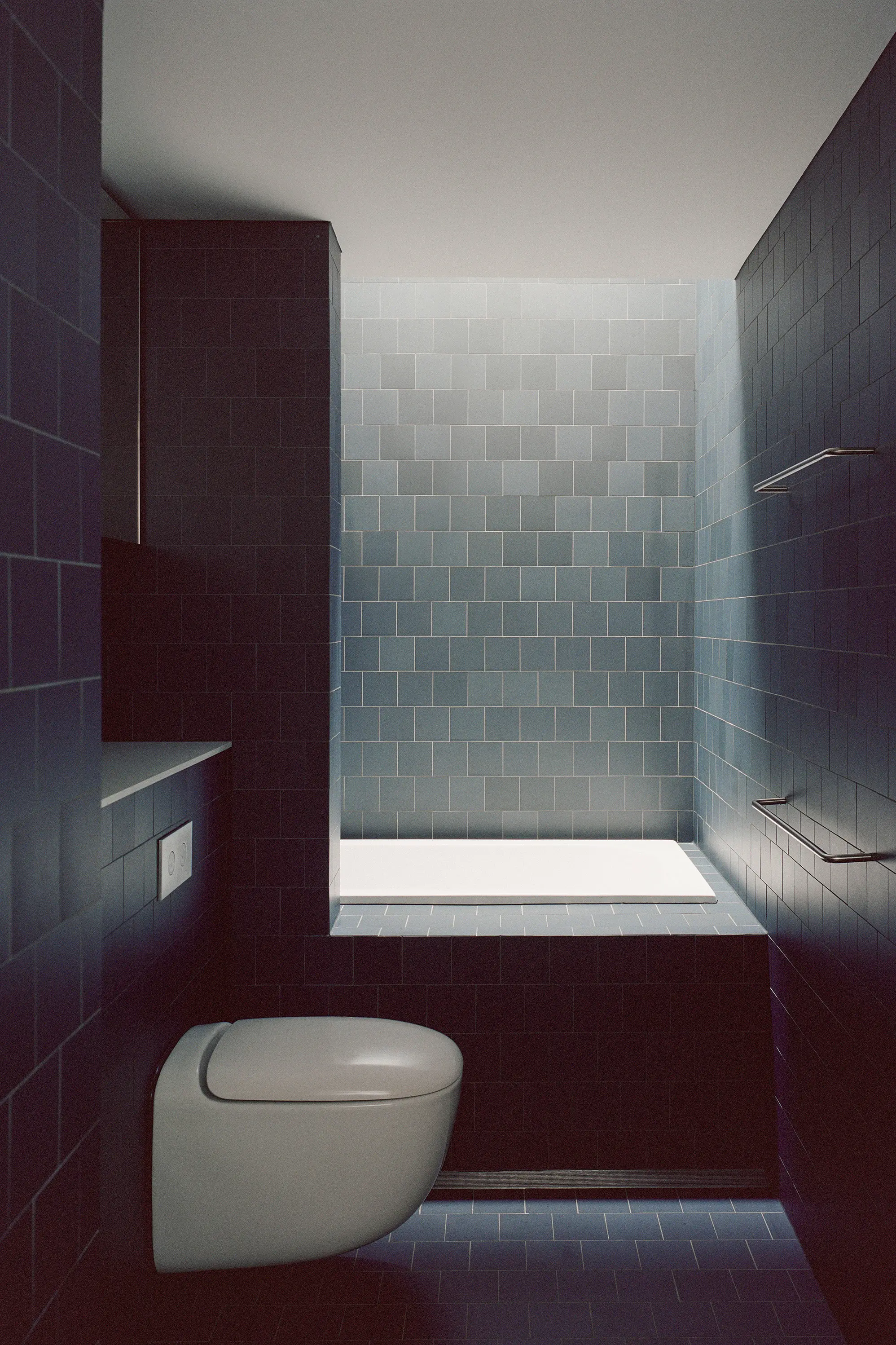 Blue tiled and painted bathroom