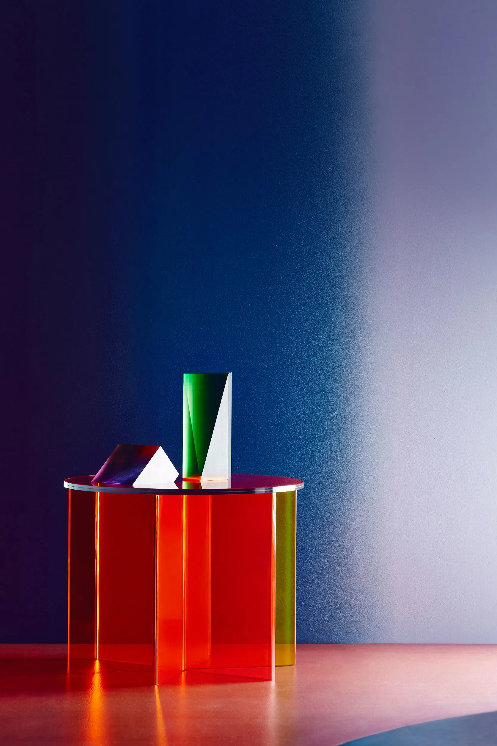 Blue and Purple wall with perspex table and shapes