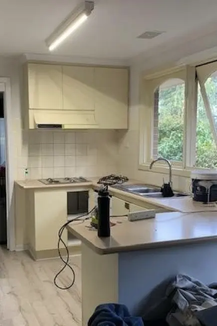 White kitchen with off-white cupboards