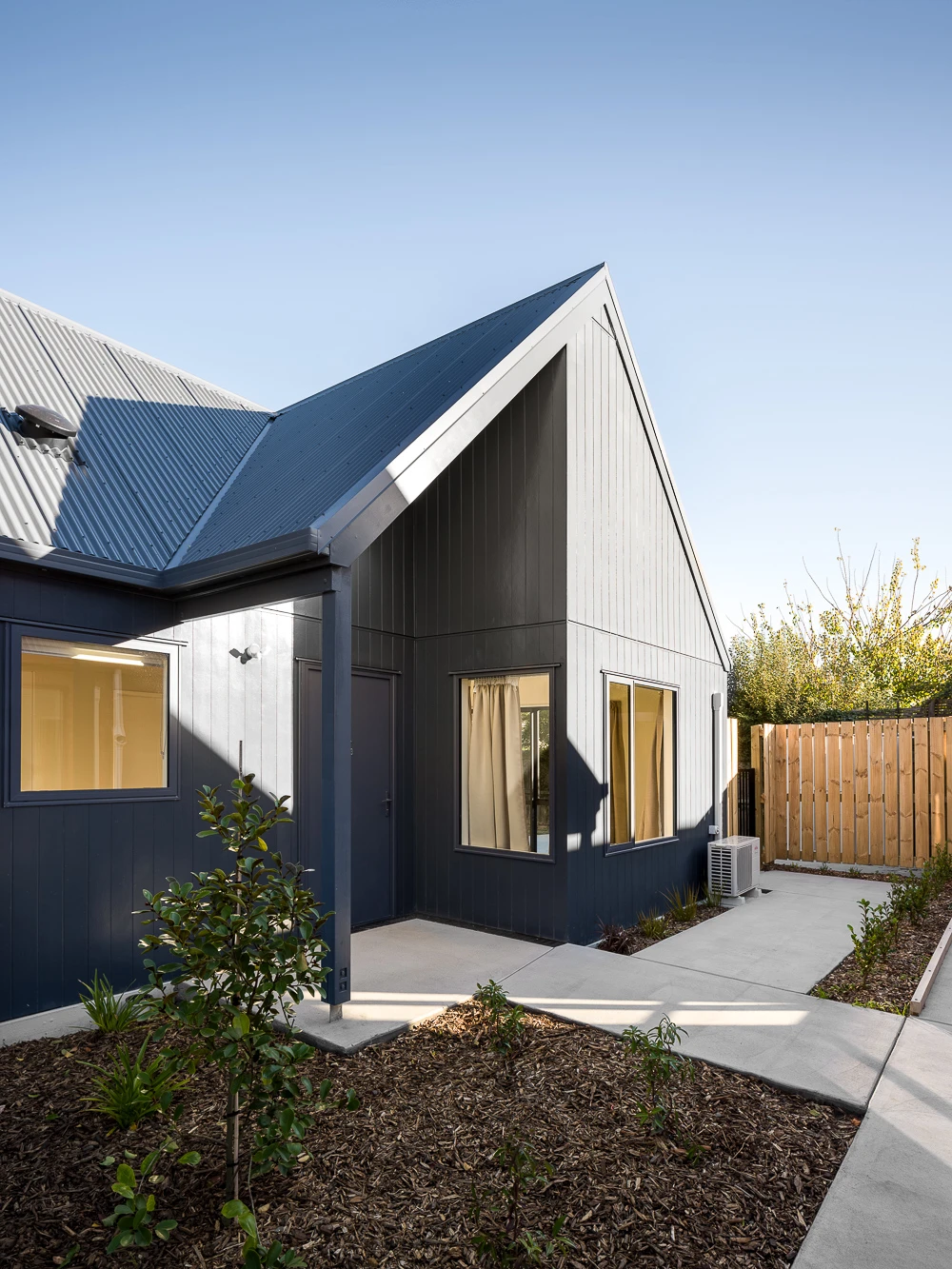 Up close of front of striking blue house