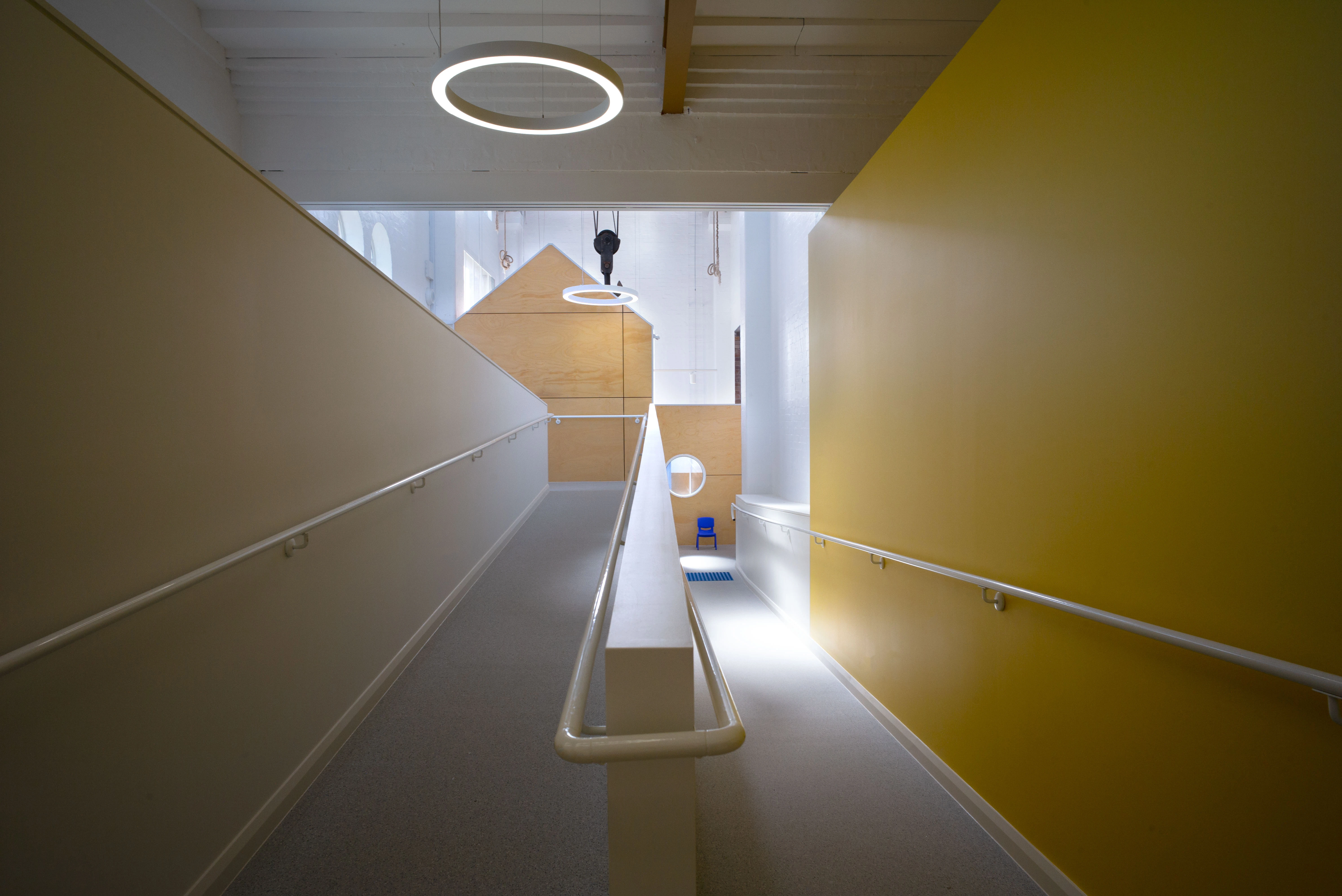 Indoor ramp with yellow walls