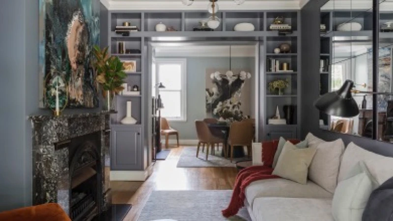 Grey living room with black marble mantle