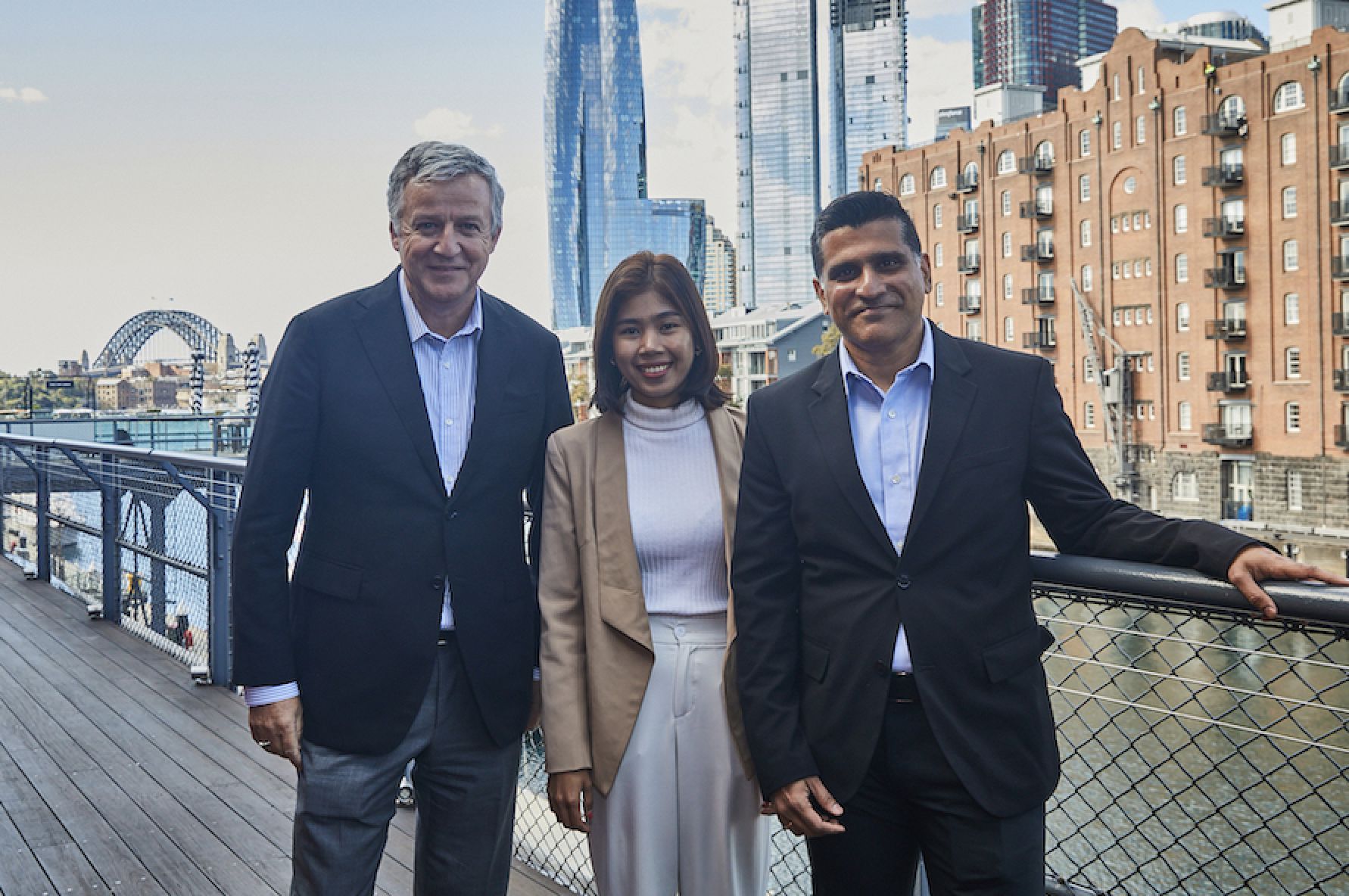 John Murphy, Coca-Cola Company President and CFO, Phearong Shedung, Executive Director of Banteay Srei and former Kiva borrower, and Vishal Ghotge, CEO of Kiva, in Sydney