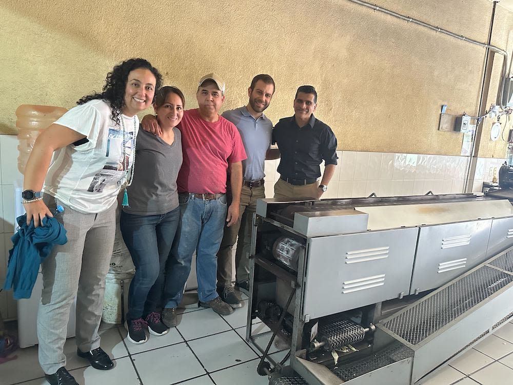 The Kiva team with Jose and his wife at his corn production facility in Mexico