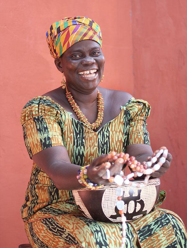 Rachel, a Kiva borrower shows some of the beads she has created