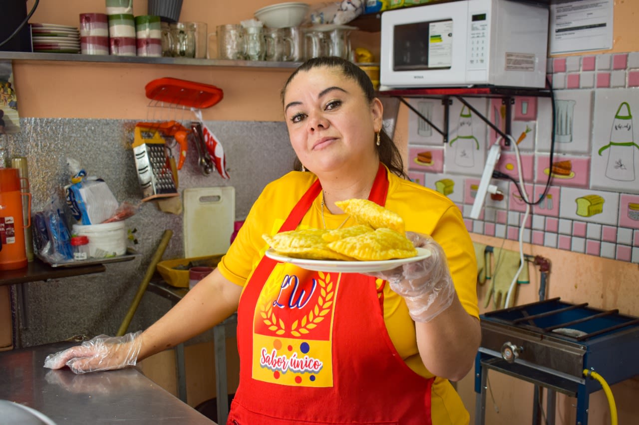 Laura and her husband borrowed through Kiva Lending Partner CACMU for their business selling typical Venezuelan food.