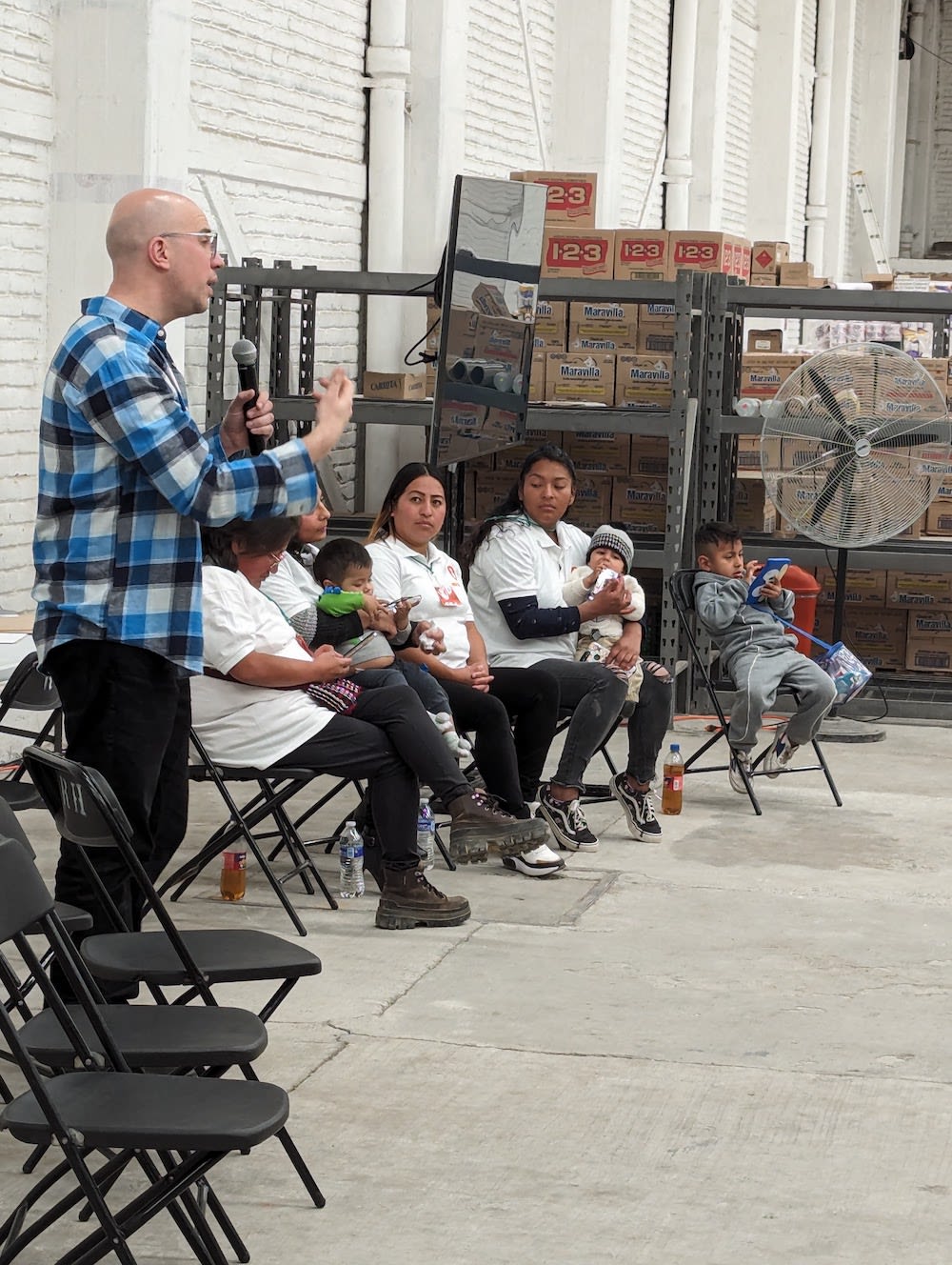 Ady, CEO of Nilus, along with a team of Community Leaders, presenting Nilus' work at their warehouse in Mexico City