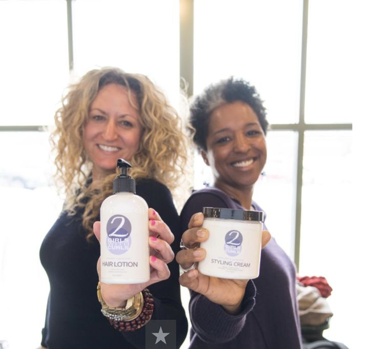 Erin and Leigh-Ann of 2 Girls with Curls show their products