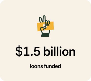 Peace sign hand illustration over $1.5 billion loans funded data