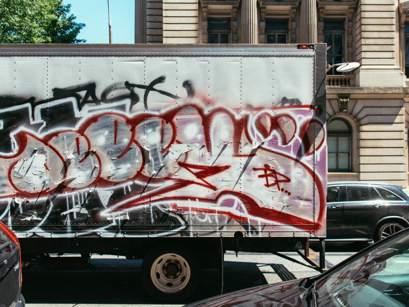 Artistic truck with graffiti painted on it