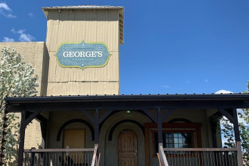 George's Distributing building with old logo on the side