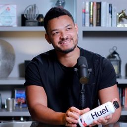 Steven Bartlett holding a Huel bottle