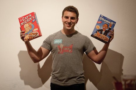 Brian Chesky holding novelty cereals