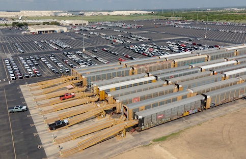 Cars loaded into freight cars picture