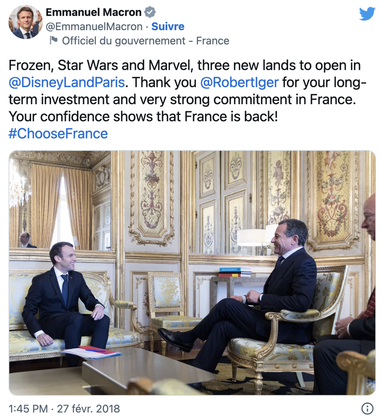 Emmanuel Macron looking happy in tweet