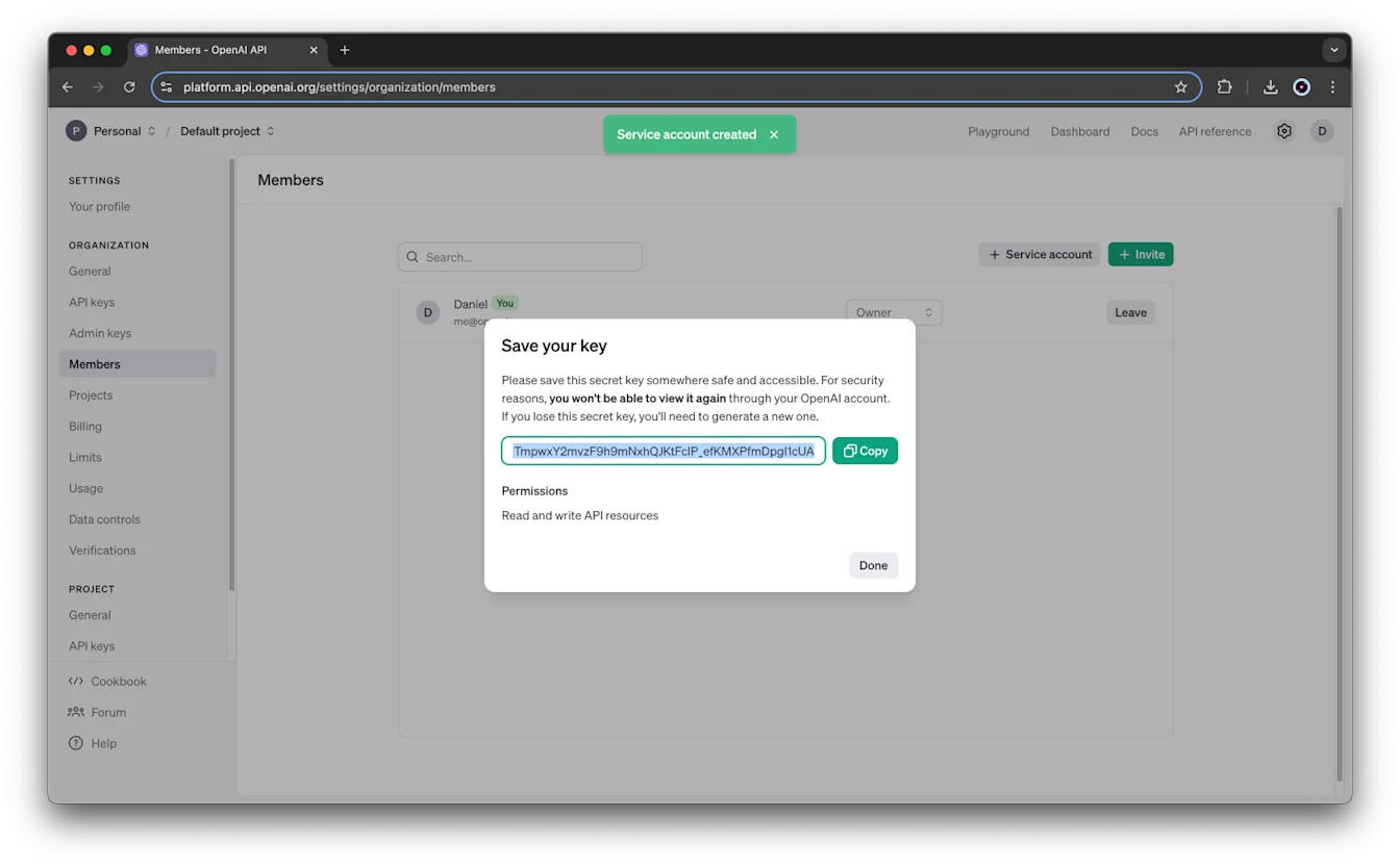 Members page with Save your key modal after creating a service account