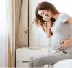 Mujer con náuseas en el embarazo