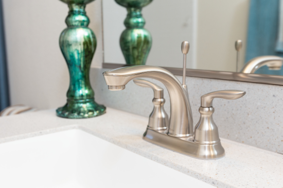 A Pfister® Faucet in a Clayton Built® bath