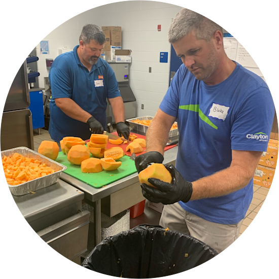 Clayton team members prepare food for Kentucky flood victims