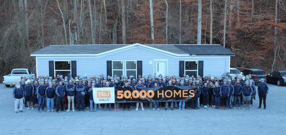 TRU Halls team members celebrate 50,000 homes