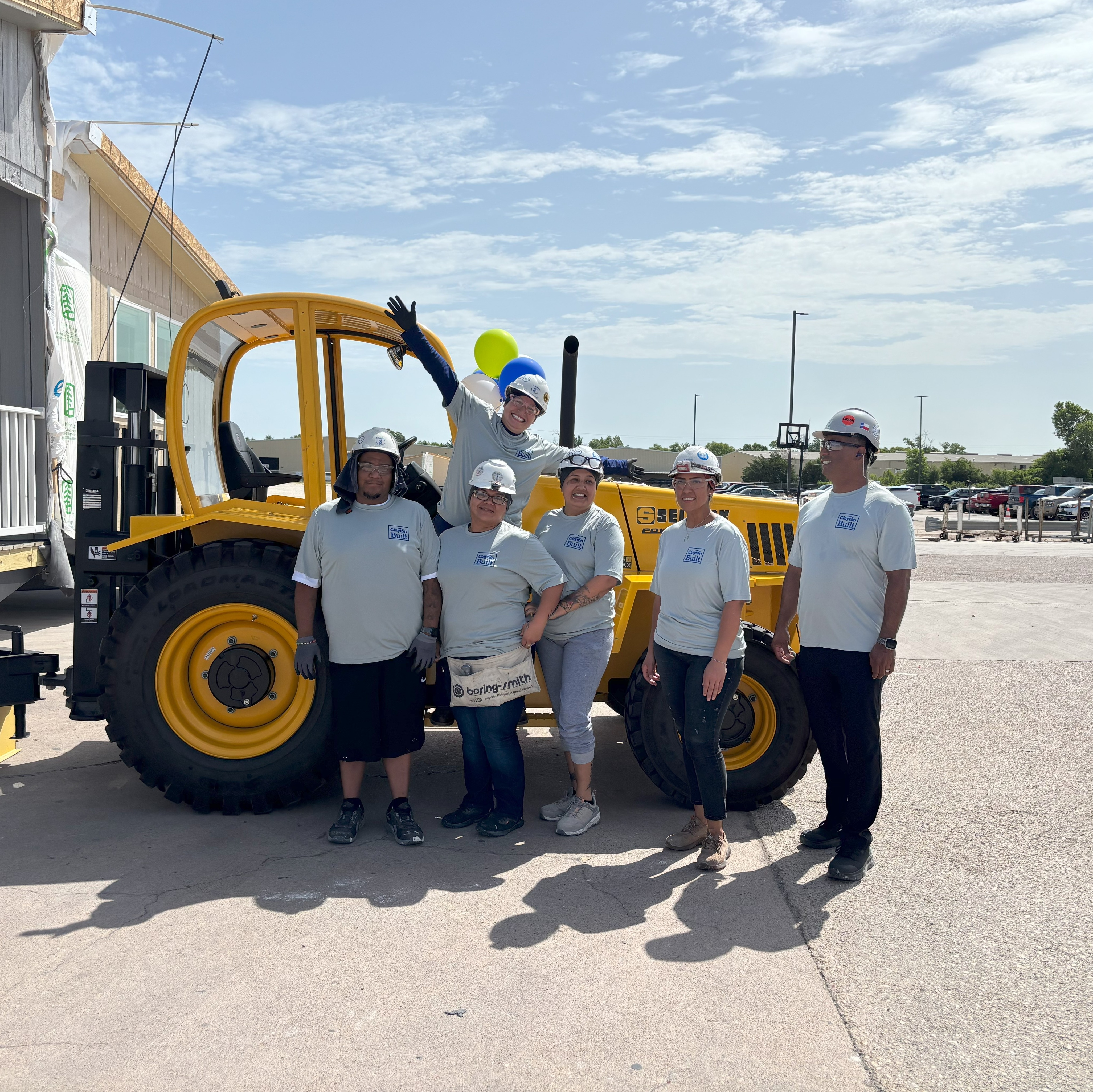 Team members with equipment at Waco II 25K homes celebration