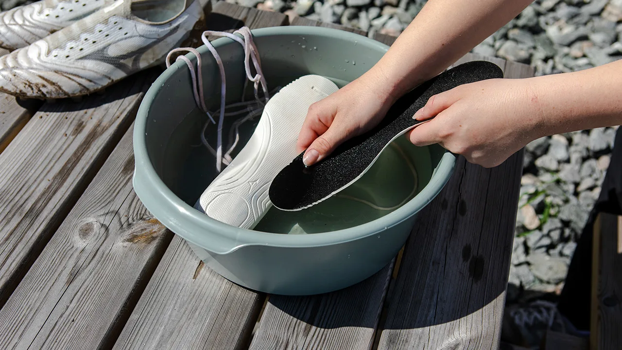 Waschen Sie die Sohle