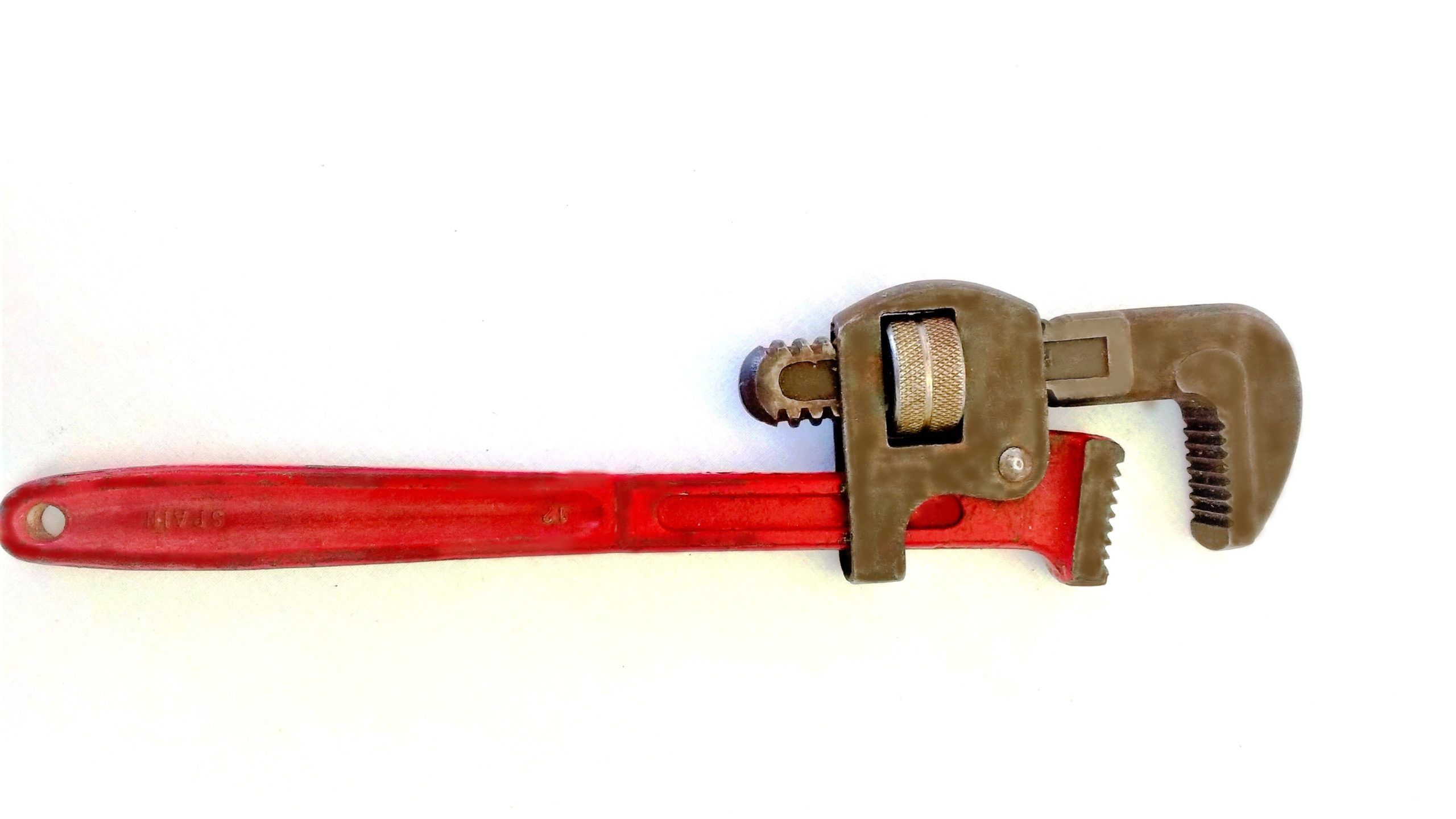 Una pequeña llave dinamométrica con herramientas de punta en una superficie  de madera marrón. Llave dinamométrica pequeña para apretar tornillos  delicados Fotografía de stock - Alamy
