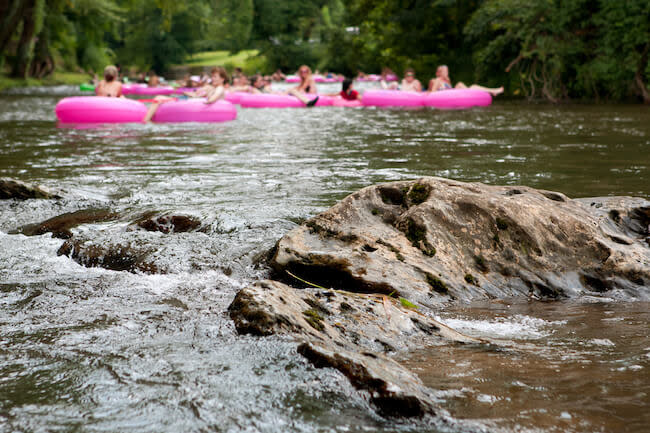 People floating down the French Broad River