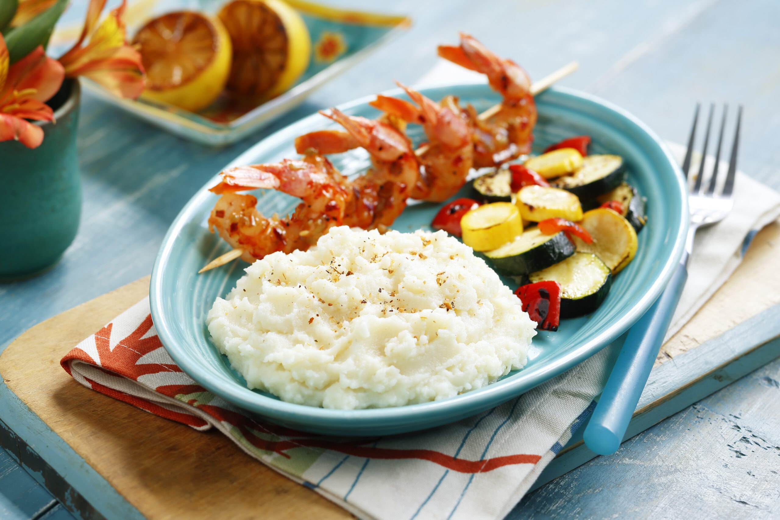 Idahoan® Chicken Broth Mashed Potatoes with Grilled Garlic Butter Shrimp and Roasted Zucchini and Peppers