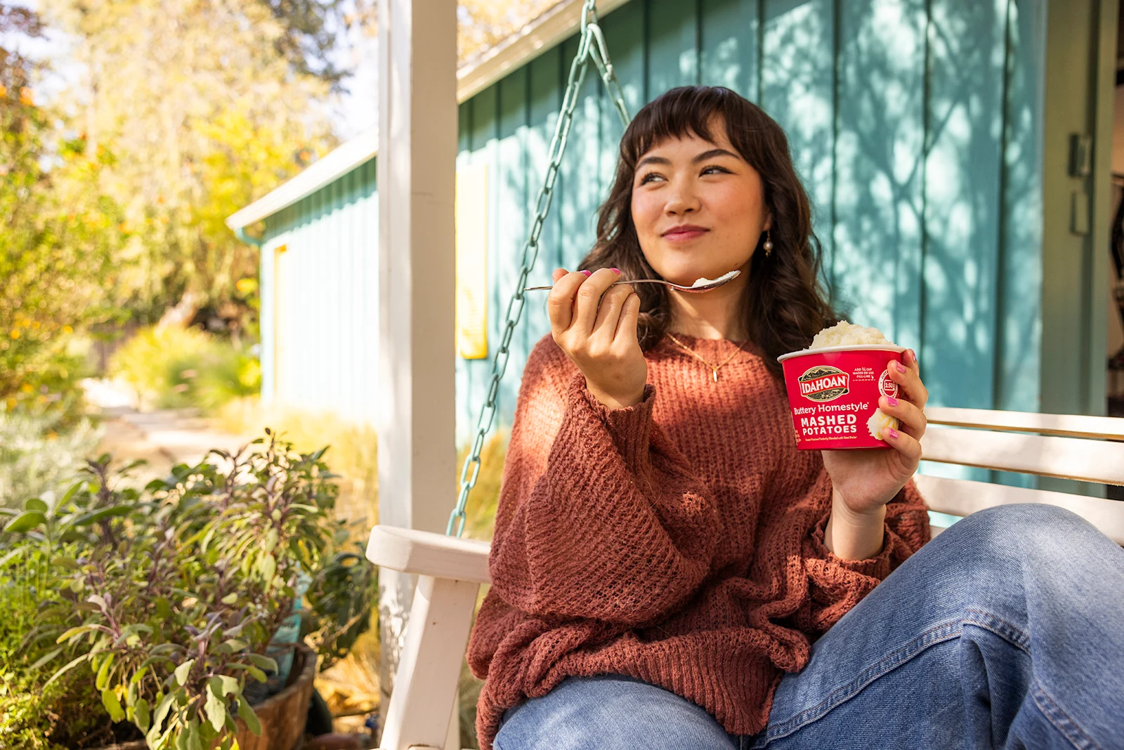 Woman enjoying Idahoan On-The-Go Cup