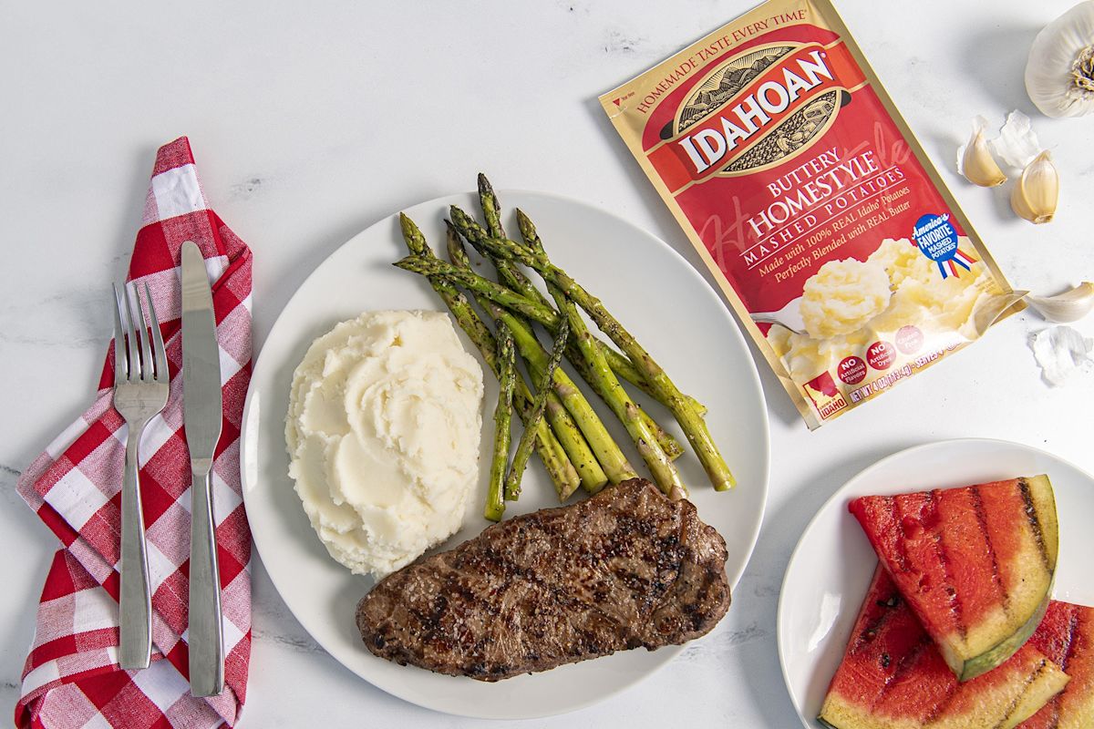 New York Strip Steak with Asparagus, Grilled Watermelon and Idahoan Buttery Homestyle Mashed Potatoes – Featured Image