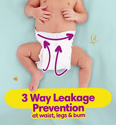 Baby from the chest down in a Pampers Active Baby diaper